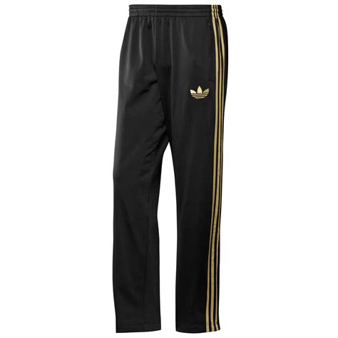 adidas jogginghose herren schwarz gold